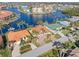 An aerial view showcasing a beautiful home on a waterfront lot at 1460 Raven Ct, Punta Gorda, FL 33950