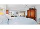 Bright bedroom with water views, a king-size bed, and ample closet space at 1460 Raven Ct, Punta Gorda, FL 33950