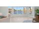 Bright dining room with water views and modern light fixture at 1460 Raven Ct, Punta Gorda, FL 33950
