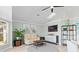 Cozy Gathering room with comfortable seating and large TV at 1460 Raven Ct, Punta Gorda, FL 33950
