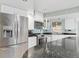 Modern kitchen with stainless steel appliances and granite countertops at 1460 Raven Ct, Punta Gorda, FL 33950