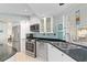 Modern kitchen with stainless steel appliances and granite countertops at 1460 Raven Ct, Punta Gorda, FL 33950