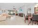Open living and dining area with water views and hardwood floors at 1460 Raven Ct, Punta Gorda, FL 33950