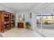 Relaxing office space with built-in bookcases and water views at 1460 Raven Ct, Punta Gorda, FL 33950