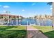 Scenic waterfront view with a walkway to the dock at 1460 Raven Ct, Punta Gorda, FL 33950