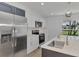 Modern kitchen featuring stainless steel appliances and white cabinets at 1543 Gorham St, North Port, FL 34288