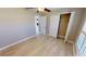 Spacious bedroom with wood-look floors and double door closet at 16129 Coruna Ct, Punta Gorda, FL 33955