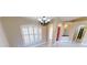 Formal dining room with neutral walls and chandelier at 16129 Coruna Ct, Punta Gorda, FL 33955