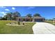 One-story house with driveway and well-manicured lawn at 16129 Coruna Ct, Punta Gorda, FL 33955