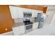 Well-equipped kitchen featuring granite counters and stainless steel appliances at 16129 Coruna Ct, Punta Gorda, FL 33955