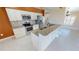 Modern kitchen with granite countertops and stainless steel appliances at 16129 Coruna Ct, Punta Gorda, FL 33955