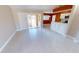 Spacious living area with tile floors and access to patio at 16129 Coruna Ct, Punta Gorda, FL 33955