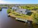 Waterfront property showcasing pool and private dock at 17456 Foremost Ln, Port Charlotte, FL 33948