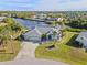 Aerial view of single-Gathering home with canal access at 17456 Foremost Ln, Port Charlotte, FL 33948