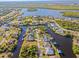 Wide aerial view showing home's waterfront location at 17456 Foremost Ln, Port Charlotte, FL 33948