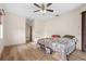 Bedroom with wood floors and ceiling fan at 17456 Foremost Ln, Port Charlotte, FL 33948