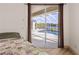 Bedroom with pool view and sliding doors at 17456 Foremost Ln, Port Charlotte, FL 33948