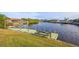 Enjoy this private dock with a picnic table overlooking the canal at 17456 Foremost Ln, Port Charlotte, FL 33948