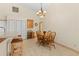 Bright dining area with wood table and chairs near kitchen at 17456 Foremost Ln, Port Charlotte, FL 33948