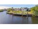 Private dock with lift and access to canal at 17456 Foremost Ln, Port Charlotte, FL 33948