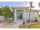 Front entry with double doors and landscaping at 17456 Foremost Ln, Port Charlotte, FL 33948