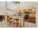 Kitchen boasts stainless steel appliances and an island with seating at 17456 Foremost Ln, Port Charlotte, FL 33948