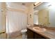 Clean bathroom with shower/tub, vanity, and tiled floor at 19071 Helena Ave, Port Charlotte, FL 33948