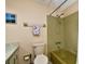 Bathroom with shower/tub combo and updated fixtures at 19071 Helena Ave, Port Charlotte, FL 33948