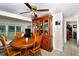 Dining room with a wooden table and chairs, and a hutch at 19071 Helena Ave, Port Charlotte, FL 33948