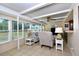 Bright sunroom with ample windows and comfortable seating at 19071 Helena Ave, Port Charlotte, FL 33948