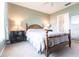 Comfortable bedroom with double bed and nightstands at 19375 Water Oak Dr # 203, Port Charlotte, FL 33948