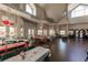 Spacious community room with hardwood floors and large windows at 19375 Water Oak Dr # 203, Port Charlotte, FL 33948