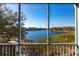 Lake view from screened porch at 19375 Water Oak Dr # 203, Port Charlotte, FL 33948
