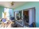 Screened porch with sliding doors at 19375 Water Oak Dr # 203, Port Charlotte, FL 33948