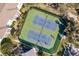 Two tennis courts and pickleball court, aerial view at 19375 Water Oak Dr # 203, Port Charlotte, FL 33948