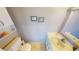 Clean and simple bathroom with a single sink vanity at 22375 Edgewater Dr # 147, Punta Gorda, FL 33980