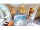 Bright bedroom with a queen-size bed and en-suite bathroom at 22375 Edgewater Dr # 147, Punta Gorda, FL 33980