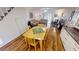 Dining area with four chairs and hardwood flooring at 22375 Edgewater Dr # 147, Punta Gorda, FL 33980