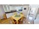 Bright kitchen features white cabinets, granite counters, and a breakfast nook at 22375 Edgewater Dr # 147, Punta Gorda, FL 33980