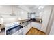 Well-equipped kitchen with white cabinets and modern appliances at 22375 Edgewater Dr # 147, Punta Gorda, FL 33980