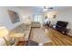 Living room with hardwood floors, comfy seating and access to patio at 22375 Edgewater Dr # 147, Punta Gorda, FL 33980