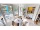 Sunroom with table and chairs, providing extra living space at 22375 Edgewater Dr # 147, Punta Gorda, FL 33980
