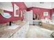 Bathroom with double vanity, soaking tub and walk-in shower at 2275 Kenya Ln, Punta Gorda, FL 33983