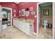 Bathroom with double vanity and separate toilet area at 2275 Kenya Ln, Punta Gorda, FL 33983