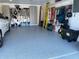 Organized garage with epoxy floor, ample storage, and room for vehicles at 2275 Kenya Ln, Punta Gorda, FL 33983