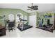 Home gym with treadmill, weights, and natural light at 2275 Kenya Ln, Punta Gorda, FL 33983