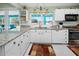 Kitchen with granite countertops, stainless steel appliances, and a view at 2275 Kenya Ln, Punta Gorda, FL 33983