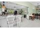 Kitchen with granite countertops and white cabinets at 2275 Kenya Ln, Punta Gorda, FL 33983