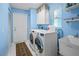 Laundry room with washer, dryer, and utility sink at 2275 Kenya Ln, Punta Gorda, FL 33983