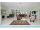 Bright and spacious living room with tiled floors at 2275 Kenya Ln, Punta Gorda, FL 33983